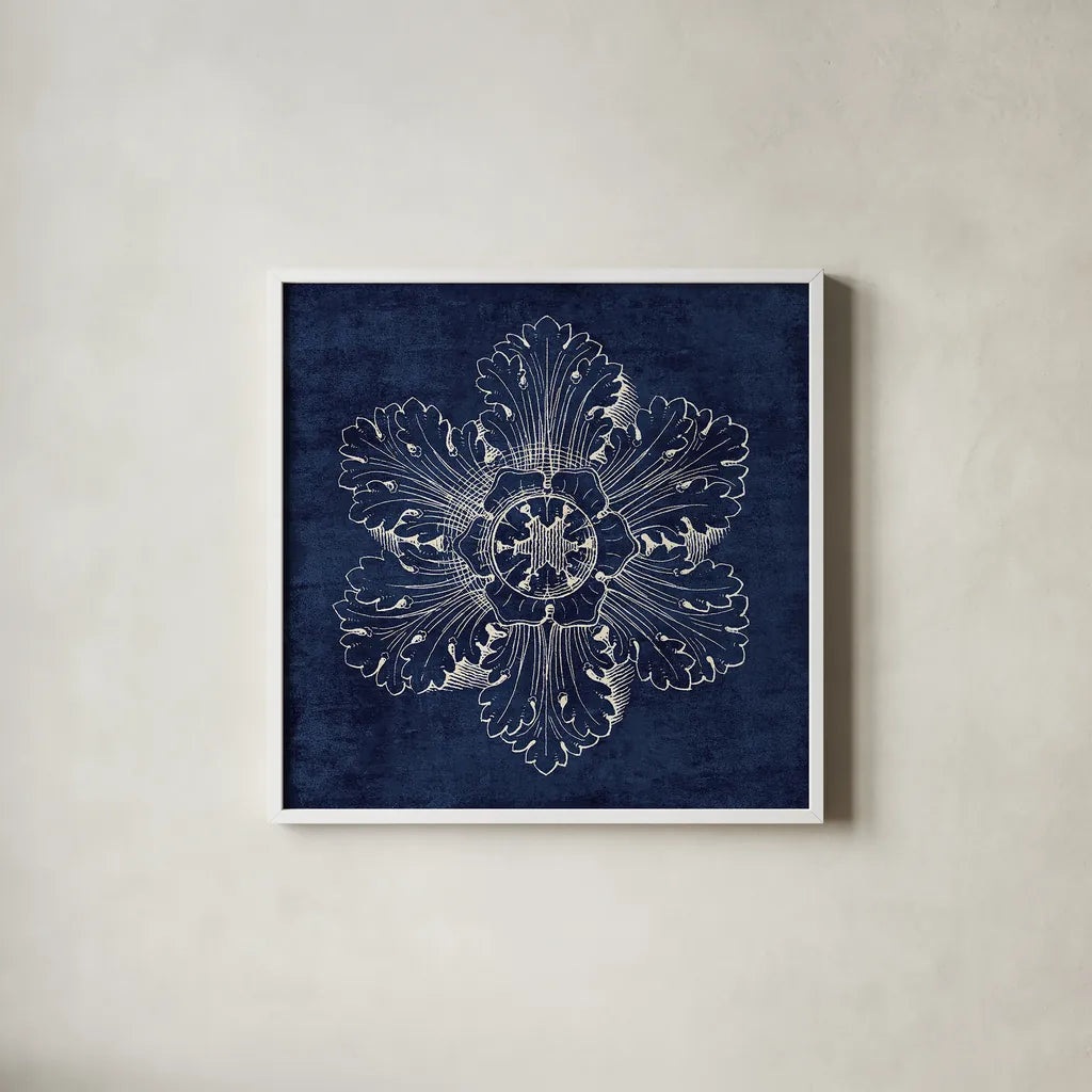 Rosette V Indigo by Wild Apple Portfolio. Shown in a crisp white glass frame for a clean and minimalist style. Available as an archival giclee rolled canvas, fine art paper, or poster print. SKU 23700a.