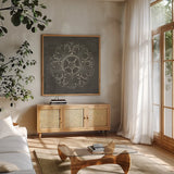 Rosette VI Gray by Wild Apple Portfolio. Shown in a natural wood frame in a cozy modern living room. Available as an archival giclee rolled canvas, fine art paper, or poster print. SKU 21578a.