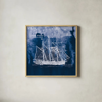 Sailing Ships II Indigo by Wild Apple Portfolio. Shown in a natural wood glass frame for a timeless modern aesthetic. Available as an archival giclee rolled canvas, fine art paper, or poster print. SKU 32099a.