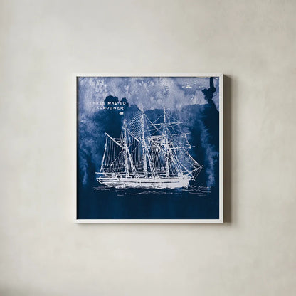 Sailing Ships II Indigo by Wild Apple Portfolio. Shown in a crisp white glass frame for a clean and minimalist style. Available as an archival giclee rolled canvas, fine art paper, or poster print. SKU 32099a.