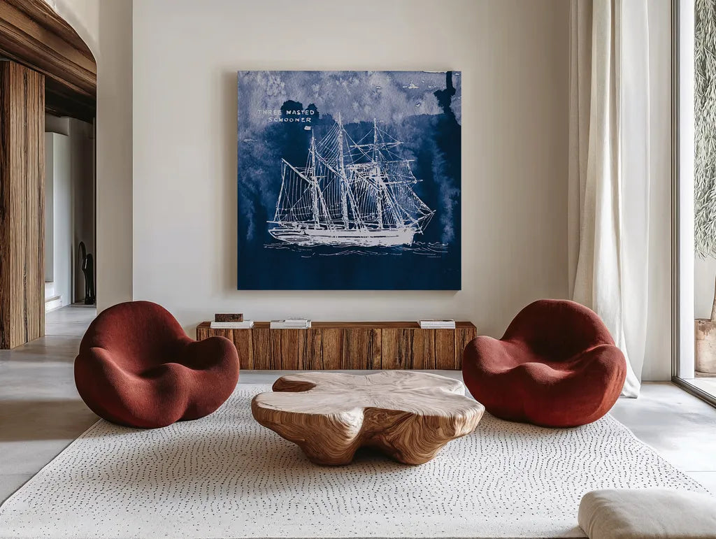 Sailing Ships II Indigo by Wild Apple Portfolio. Shown as extra-large giant wall art in a modern living room. Available as an archival giclee rolled canvas, fine art paper, or poster print. SKU 32099a.