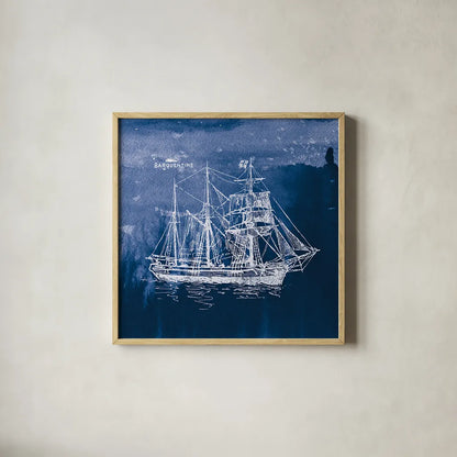 Sailing Ships III Indigo by Wild Apple Portfolio. Shown in a natural wood glass frame for a timeless modern aesthetic. Available as an archival giclee rolled canvas, fine art paper, or poster print. SKU 32100a.