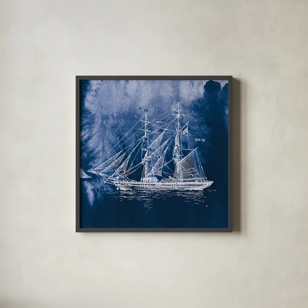 Sailing Ships IV Indigo by Wild Apple Portfolio. Shown in a sleek black glass frame for a contemporary gallery look. Available as an archival giclee rolled canvas, fine art paper, or poster print. SKU 32101a.