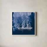 Sailing Ships IV Indigo by Wild Apple Portfolio. Shown in a crisp white glass frame for a clean and minimalist style. Available as an archival giclee rolled canvas, fine art paper, or poster print. SKU 32101a.