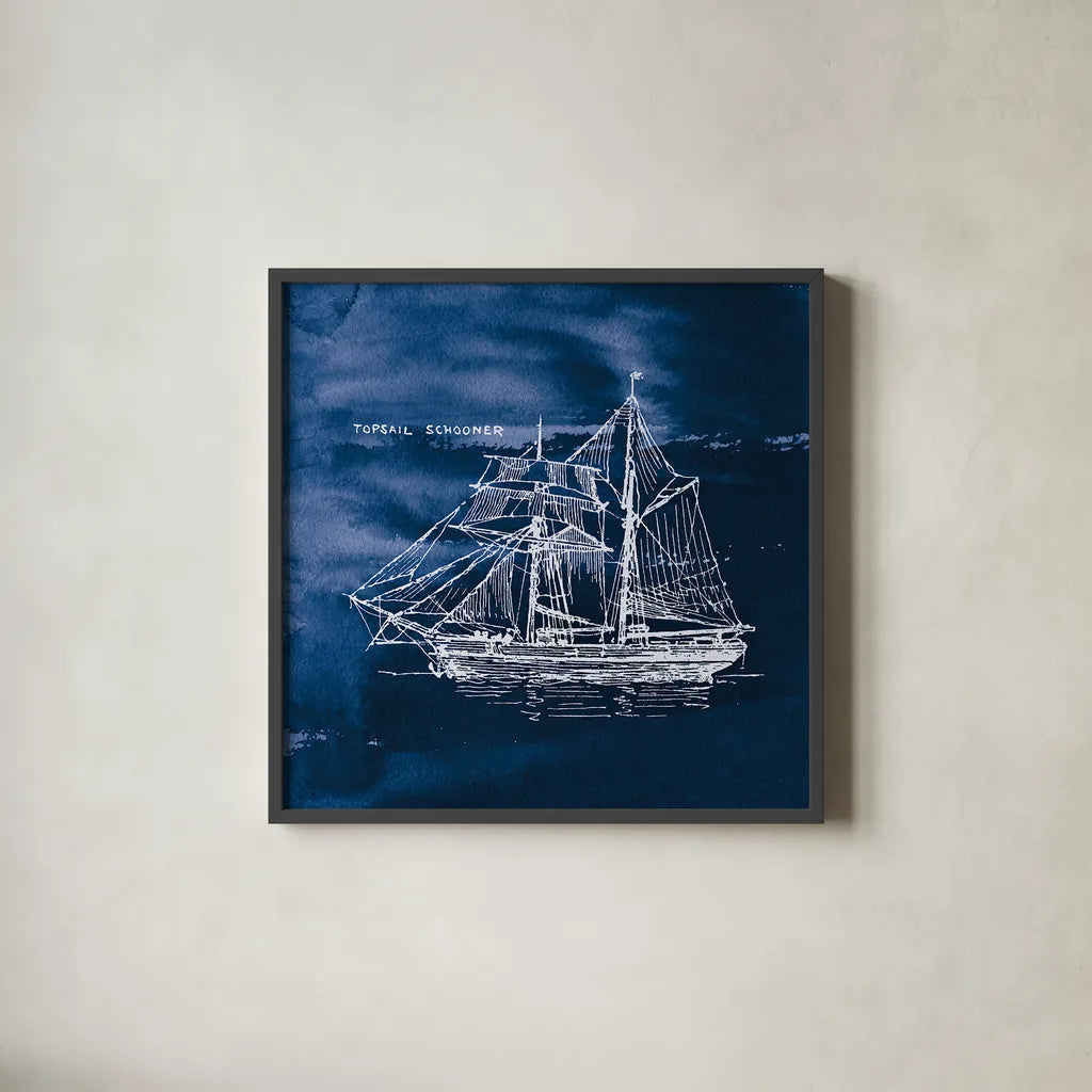 Sailing Ships V Indigo by Wild Apple Portfolio. Shown in a sleek black glass frame for a contemporary gallery look. Available as an archival giclee rolled canvas, fine art paper, or poster print. SKU 32102a.