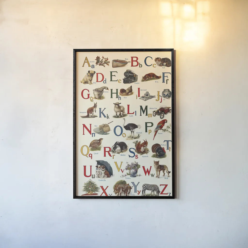 Schoolhouse Alphabet by Wild Apple Portfolio. shown as a paper print in a black flame. Available as a archival giclee rolled canvas, fine art paper, or poster print. SKU 71606h.
