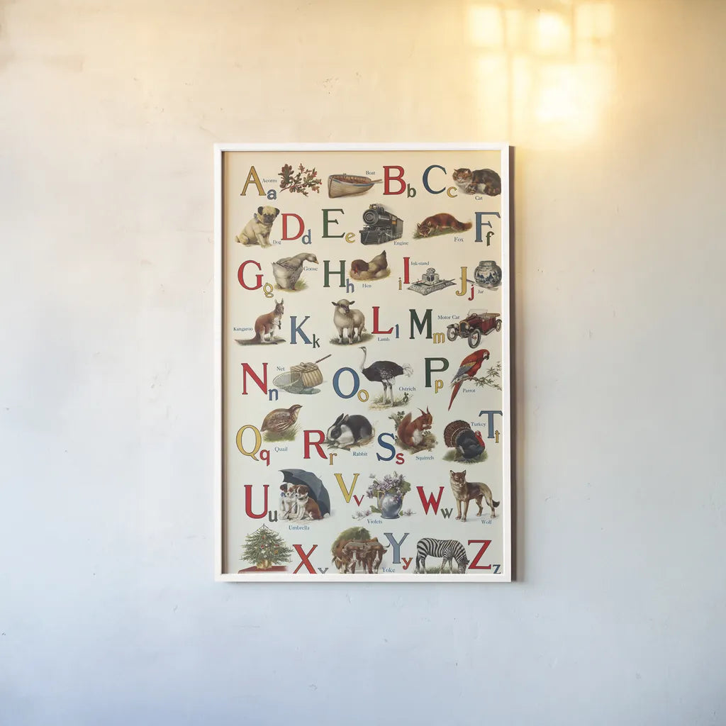 Schoolhouse Alphabet by Wild Apple Portfolio. shown as a paper print in a white frame. Available as a archival giclee rolled canvas, fine art paper, or poster print. SKU 71606h.