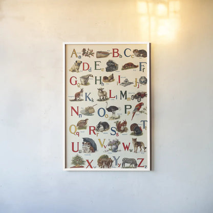 Schoolhouse Alphabet by Wild Apple Portfolio. shown as a paper print in a white frame. Available as a archival giclee rolled canvas, fine art paper, or poster print. SKU 71606h.