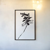Silhouette Floral II by Wild Apple Portfolio. shown as a paper print in a black flame. Available as a archival giclee rolled canvas, fine art paper, or poster print. SKU 71332h.
