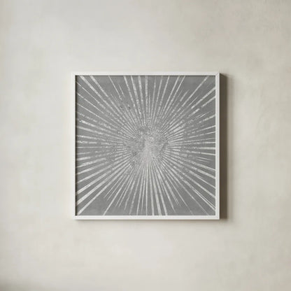 Silver Sunburst I by Wild Apple Portfolio. Shown in a crisp white glass frame for a clean and minimalist style. Available as an archival giclee rolled canvas, fine art paper, or poster print. SKU 73126a.