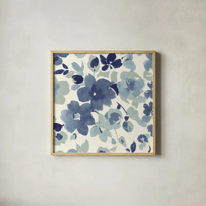 Soft Blue Florals II by Wild Apple Portfolio. Shown in a natural wood glass frame for a timeless modern aesthetic. Available as an archival giclee rolled canvas, fine art paper, or poster print. SKU 56490a.