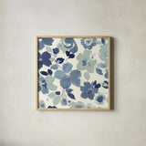 Soft Blue Florals III by Wild Apple Portfolio. Shown in a natural wood glass frame for a timeless modern aesthetic. Available as an archival giclee rolled canvas, fine art paper, or poster print. SKU 56491a.