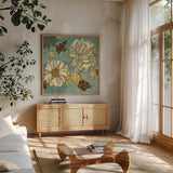 Sophias Flowers Blue I by Wild Apple Portfolio. Shown in a natural wood frame in a cozy modern living room. Available as an archival giclee rolled canvas, fine art paper, or poster print. SKU 8372a.