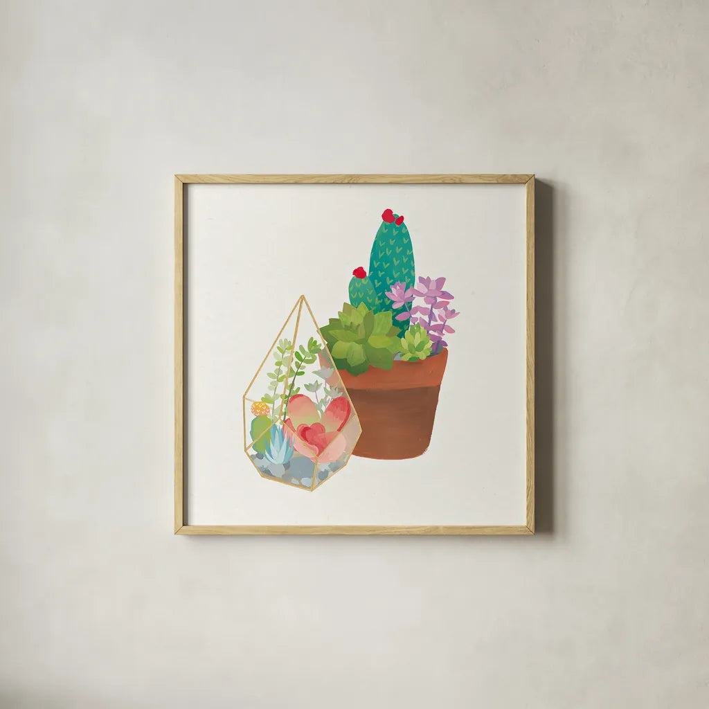 Succulent Garden I by Wild Apple Portfolio. Shown in a natural wood glass frame for a timeless modern aesthetic. Available as an archival giclee rolled canvas, fine art paper, or poster print. SKU 21555a.