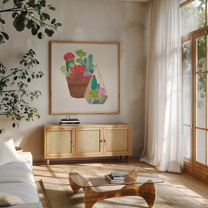 Succulent Garden IV by Wild Apple Portfolio. Shown in a natural wood frame in a cozy modern living room. Available as an archival giclee rolled canvas, fine art paper, or poster print. SKU 21558a.