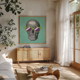 Sunny Skull II by Wild Apple Portfolio. Shown in a natural wood frame in a cozy modern living room. Available as an archival giclee rolled canvas, fine art paper, or poster print. SKU 21660a.