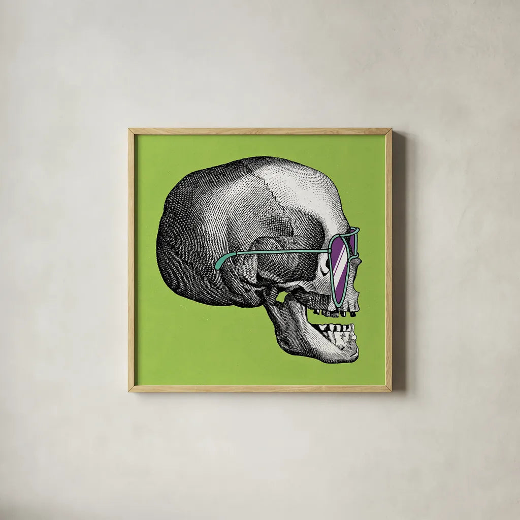 Sunny Skull III by Wild Apple Portfolio. Shown in a natural wood glass frame for a timeless modern aesthetic. Available as an archival giclee rolled canvas, fine art paper, or poster print. SKU 21661a.