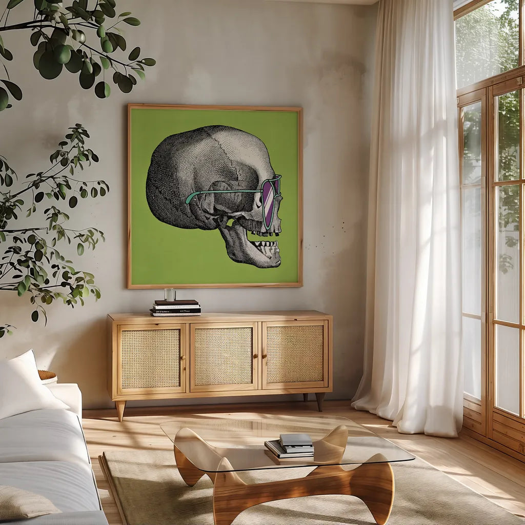 Sunny Skull III by Wild Apple Portfolio. Shown in a natural wood frame in a cozy modern living room. Available as an archival giclee rolled canvas, fine art paper, or poster print. SKU 21661a.