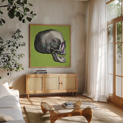 Sunny Skull III by Wild Apple Portfolio. Shown in a natural wood frame in a cozy modern living room. Available as an archival giclee rolled canvas, fine art paper, or poster print. SKU 21661a.