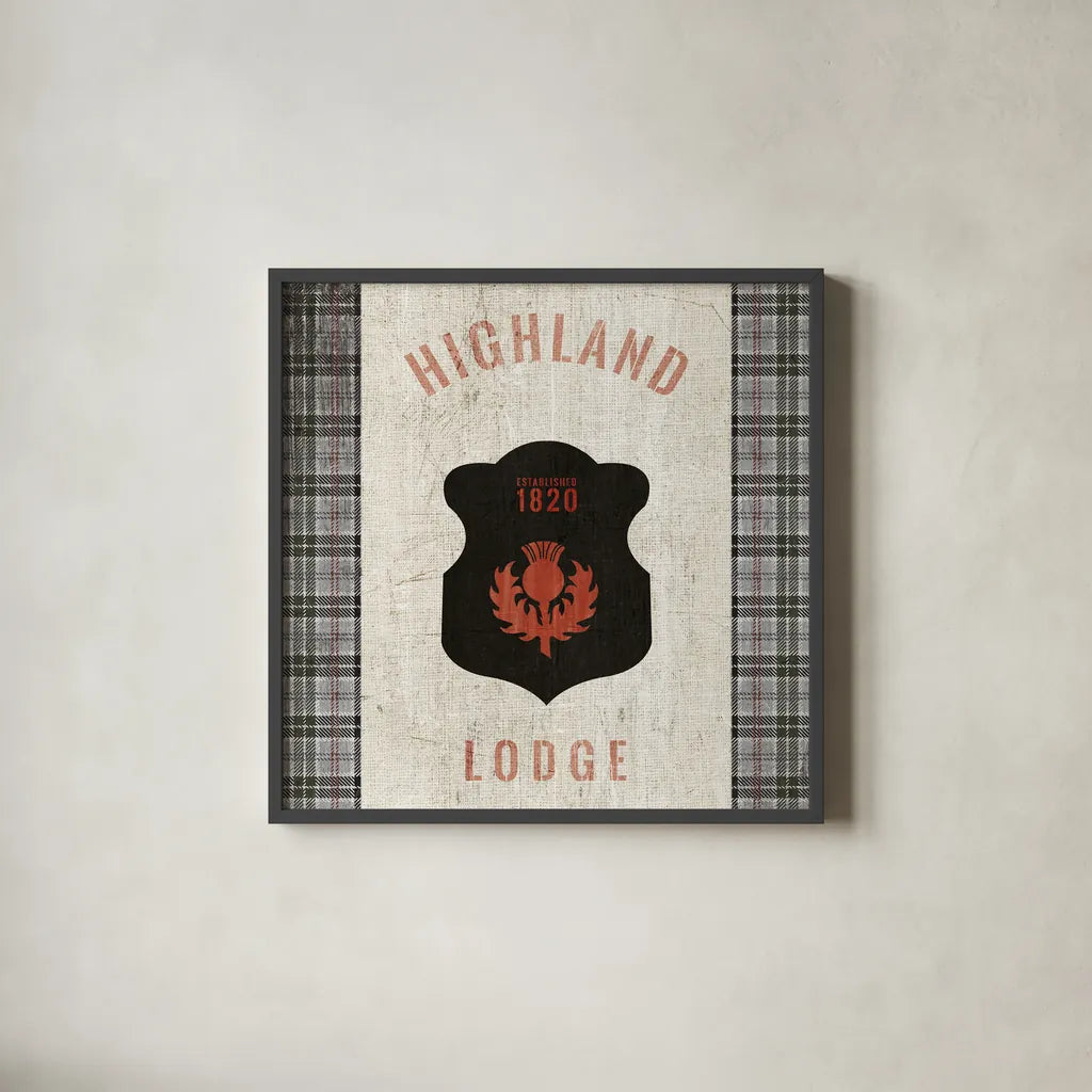 Tartan Lodge Shield I by Wild Apple Portfolio. Shown in a sleek black glass frame for a contemporary gallery look. Available as an archival giclee rolled canvas, fine art paper, or poster print. SKU 50336a.