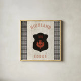Tartan Lodge Shield I by Wild Apple Portfolio. Shown in a natural wood glass frame for a timeless modern aesthetic. Available as an archival giclee rolled canvas, fine art paper, or poster print. SKU 50336a.