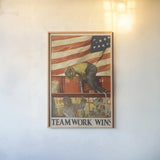 Teamwork Wins by Wild Apple Portfolio. shown as a paper print in a natural frame. Available as a archival giclee rolled canvas, fine art paper, or poster print. SKU 103770h.