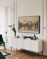 The Ski Start by Wild Apple Portfolio. shown as a framed stretched canvas in a living room above a console. Available as a archival giclee rolled canvas, fine art paper, or poster print. SKU 70706i.