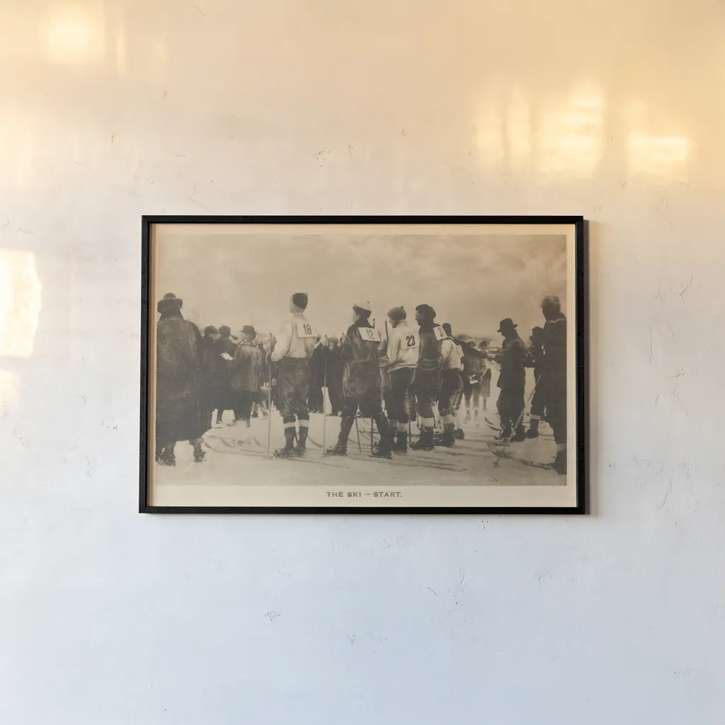 The Ski Start by Wild Apple Portfolio. shown as a paper print in a black flame. Available as a archival giclee rolled canvas, fine art paper, or poster print. SKU 70706i.