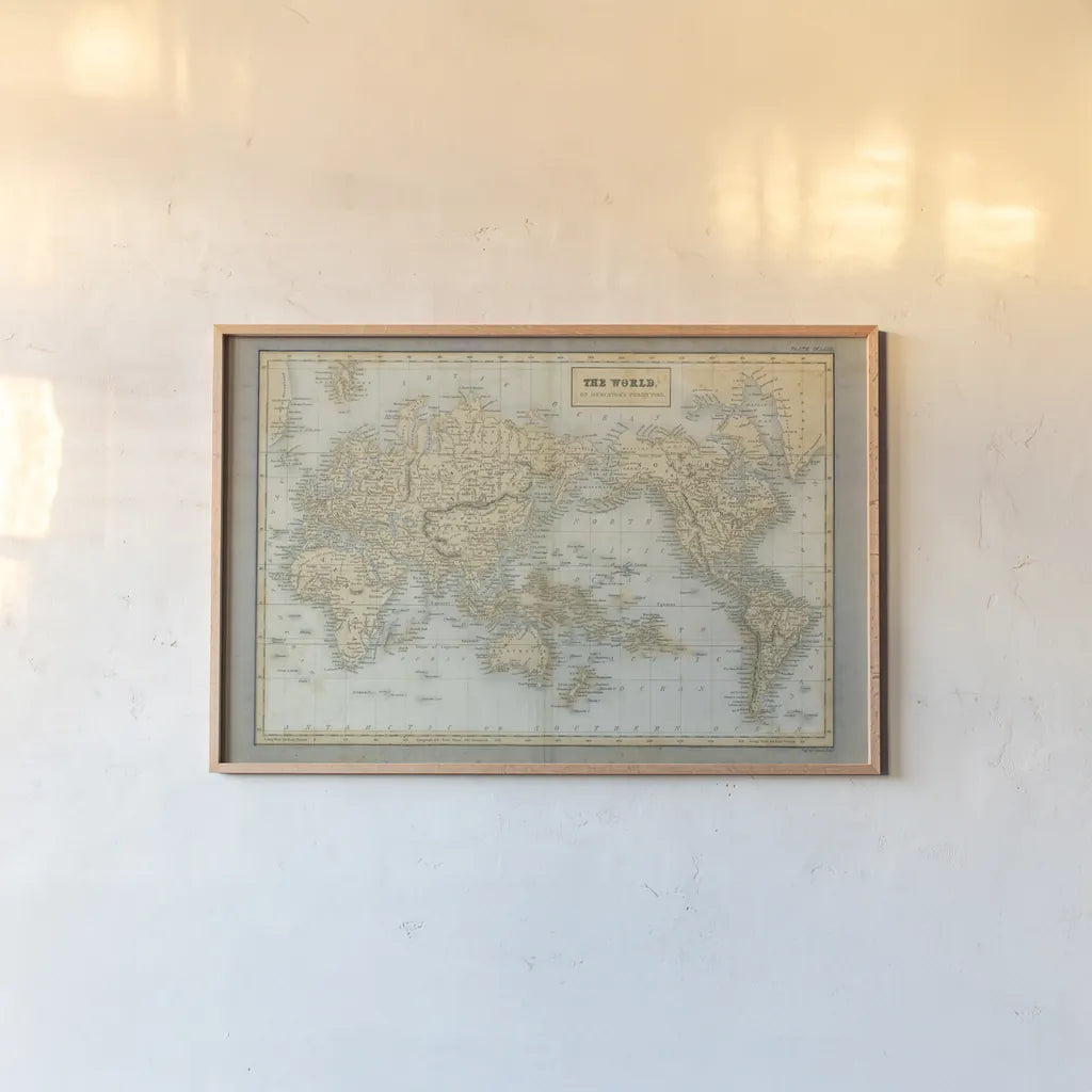 The World Map Neutral by Wild Apple Portfolio. shown as a paper print in a natural frame. Available as a archival giclee rolled canvas, fine art paper, or poster print. SKU 51556i.