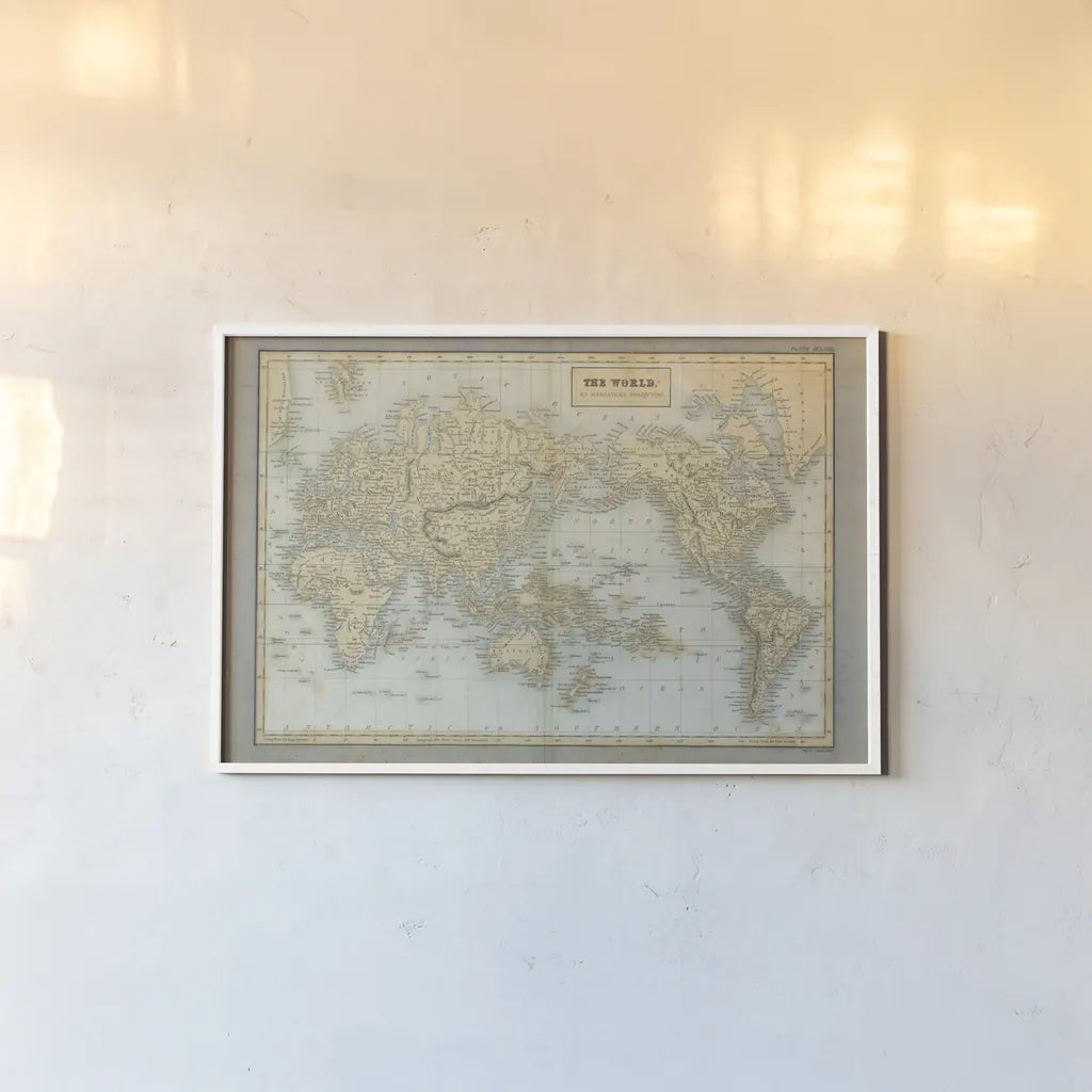 The World Map Neutral by Wild Apple Portfolio. shown as a paper print in a white frame. Available as a archival giclee rolled canvas, fine art paper, or poster print. SKU 51556i.