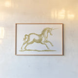 Unicorn Fantasy by Wild Apple Portfolio. shown as a paper print in a natural frame. Available as a archival giclee rolled canvas, fine art paper, or poster print. SKU 33800i.