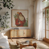 Victorian Santa I by Wild Apple Portfolio. Shown in a natural wood frame in a cozy modern living room. Available as an archival giclee rolled canvas, fine art paper, or poster print. SKU 57211a.