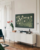 Vintage Flowers on Green by Wild Apple Portfolio. shown as a framed stretched canvas in a living room above a console. Available as a archival giclee rolled canvas, fine art paper, or poster print. SKU 86643i.