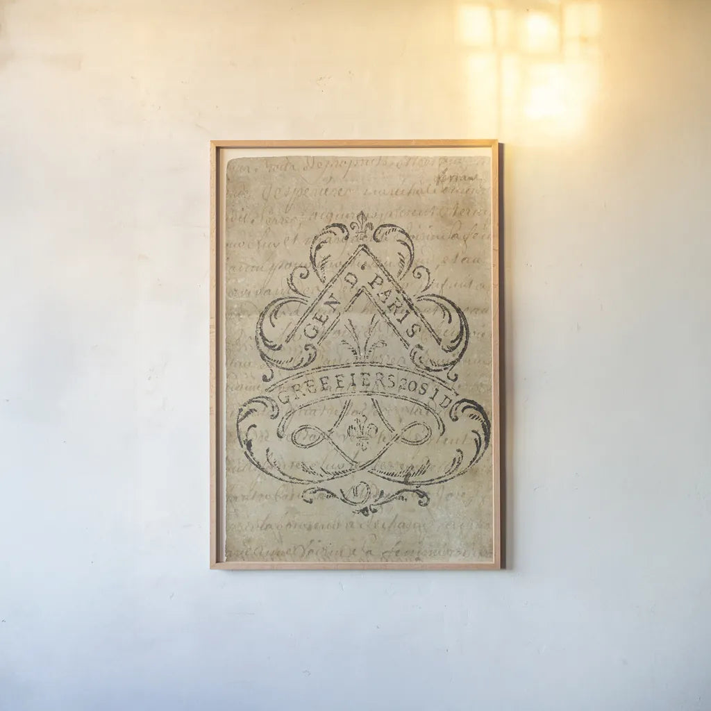Vintage Letter Crest I Antique Border V2 by Wild Apple Portfolio. shown as a paper print in a natural frame. Available as a archival giclee rolled canvas, fine art paper, or poster print. SKU 37706h.
