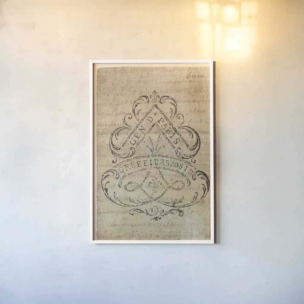 Vintage Letter Crest I Antique Border V2 by Wild Apple Portfolio. shown as a paper print in a white frame. Available as a archival giclee rolled canvas, fine art paper, or poster print. SKU 37706h.