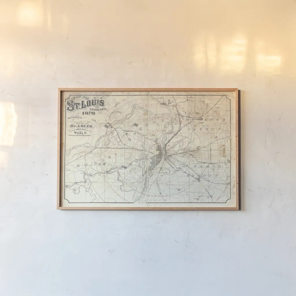 Vintage St Louis Map v2 by Wild Apple Portfolio. shown as a paper print in a natural frame. Available as a archival giclee rolled canvas, fine art paper, or poster print. SKU 68692i.