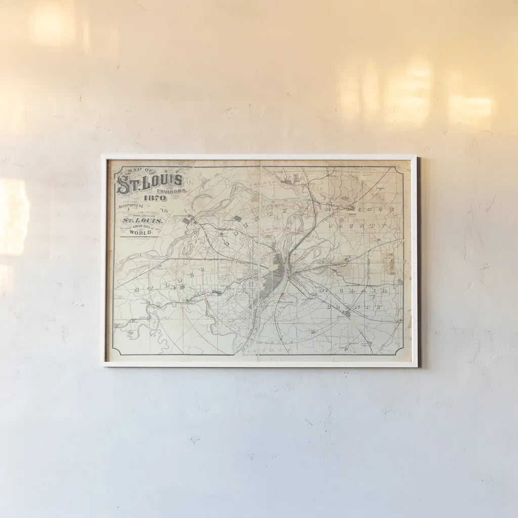 Vintage St Louis Map v2 by Wild Apple Portfolio. shown as a paper print in a white frame. Available as a archival giclee rolled canvas, fine art paper, or poster print. SKU 68692i.