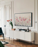 Watercolor Garden Light by Wild Apple Portfolio. shown as a framed stretched canvas in a living room above a console. Available as a archival giclee rolled canvas, fine art paper, or poster print. SKU 32928i.
