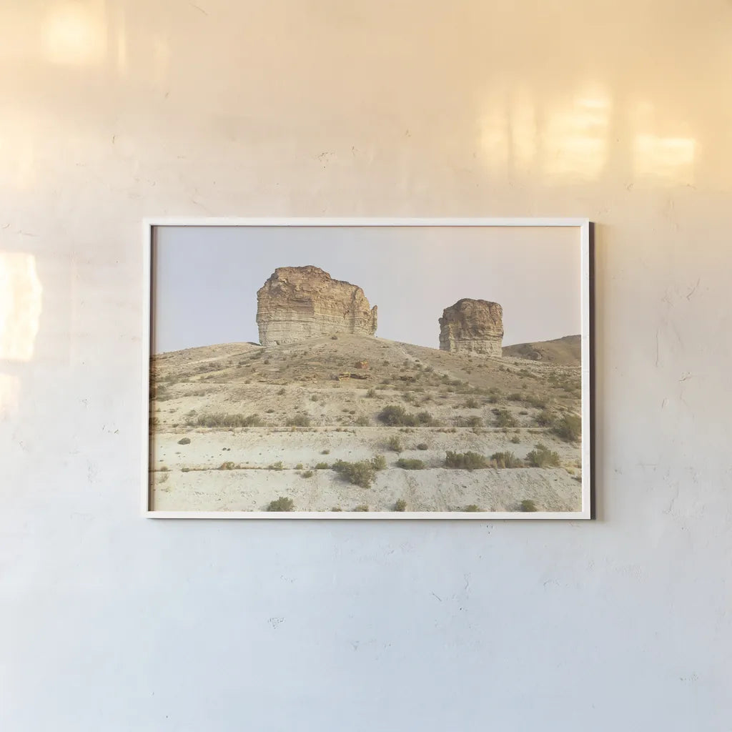 Western Buttes by Wild Apple Portfolio. shown as a paper print in a white frame. Available as a archival giclee rolled canvas, fine art paper, or poster print. SKU 74443i.