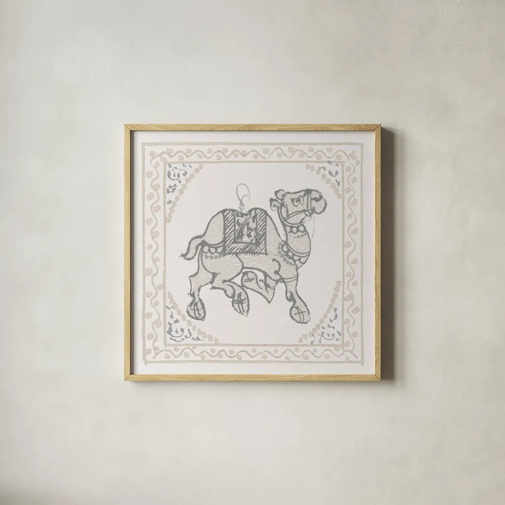 Winter Caravan Camel by Wild Apple Portfolio. Shown in a natural wood glass frame for a timeless modern aesthetic. Available as an archival giclee rolled canvas, fine art paper, or poster print. SKU 56842a.