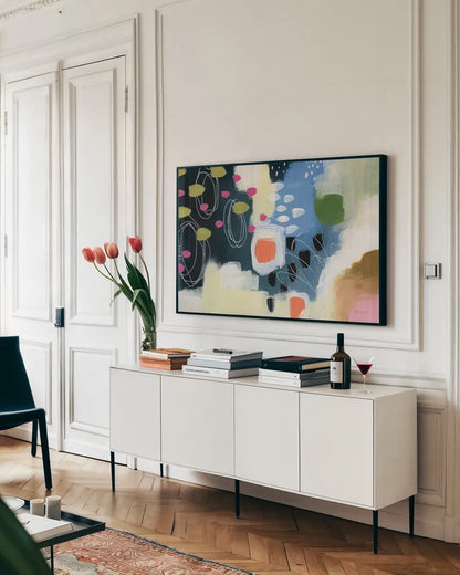 Abstract Spring by Yvette St. Amant. shown as a framed stretched canvas in a living room above a console. Available as a archival giclee rolled canvas, fine art paper, or poster print. SKU 89154i.