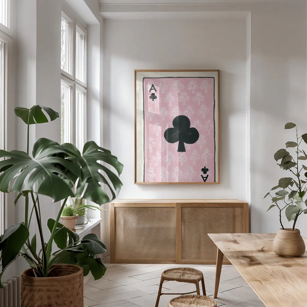 Ace of Clubs by Yvette St. Amant. shown as a print in a natural wood frame in a dining room. Available as a archival giclee rolled canvas, fine art paper, or poster print. SKU 93237h.