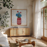 American Gnome VII by Yvette St. Amant. Shown in a natural wood frame in a cozy modern living room. Available as an archival giclee rolled canvas, fine art paper, or poster print. SKU 91835a.