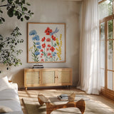 Among the Wildflowers III by Yvette St. Amant. Shown in a natural wood frame in a cozy modern living room. Available as an archival giclee rolled canvas, fine art paper, or poster print. SKU 104614a.