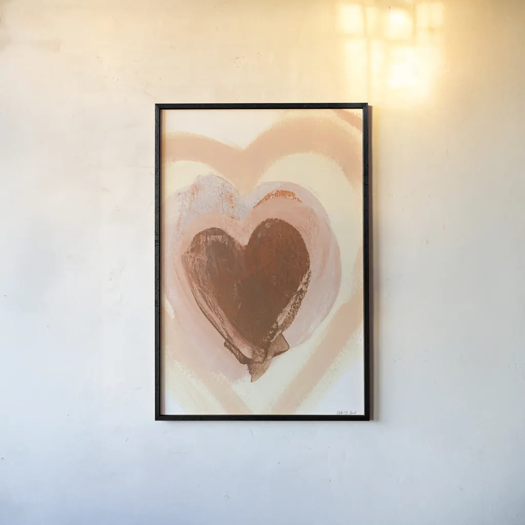 Baby Love Heart by Yvette St. Amant. shown as a paper print in a black flame. Available as a archival giclee rolled canvas, fine art paper, or poster print. SKU 89996h.