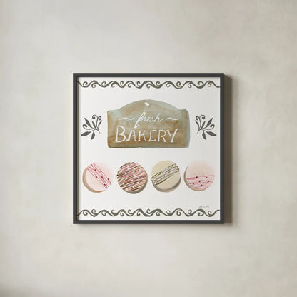 Bake Shoppe I by Yvette St. Amant. Shown in a sleek black glass frame for a contemporary gallery look. Available as an archival giclee rolled canvas, fine art paper, or poster print. SKU 96780a.