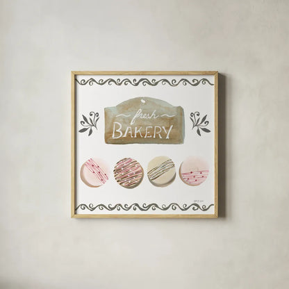 Bake Shoppe I by Yvette St. Amant. Shown in a natural wood glass frame for a timeless modern aesthetic. Available as an archival giclee rolled canvas, fine art paper, or poster print. SKU 96780a.