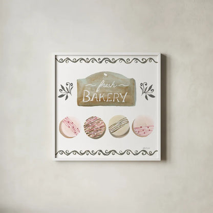 Bake Shoppe I by Yvette St. Amant. Shown in a crisp white glass frame for a clean and minimalist style. Available as an archival giclee rolled canvas, fine art paper, or poster print. SKU 96780a.