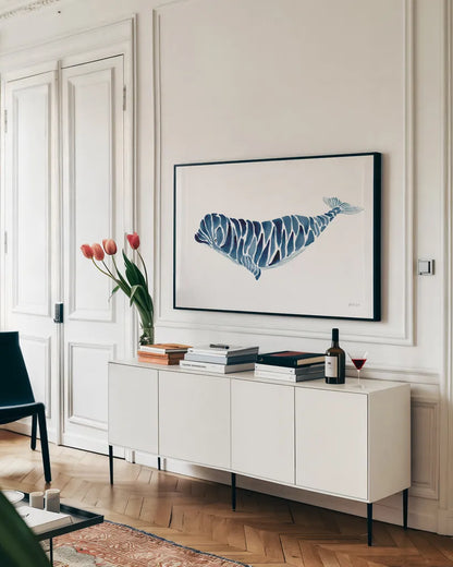 Beluga Whale by Yvette St. Amant. shown as a framed stretched canvas in a living room above a console. Available as a archival giclee rolled canvas, fine art paper, or poster print. SKU 90113i.