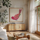 Blooming Bird II by Yvette St. Amant. Shown in a natural wood frame in a cozy modern living room. Available as an archival giclee rolled canvas, fine art paper, or poster print. SKU 92586a.